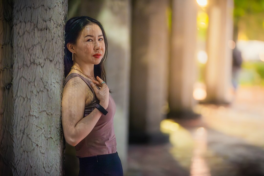 Portrait of a Chinese Singaporean female backend instructor