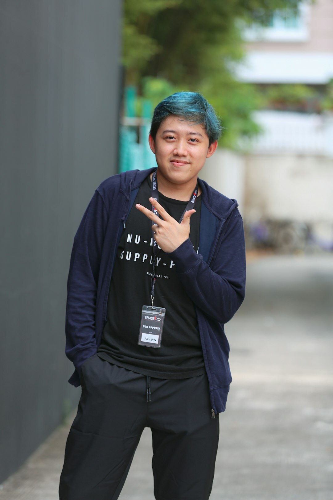 Portrait of a Chinese Singaporean male programming instructor smiling
