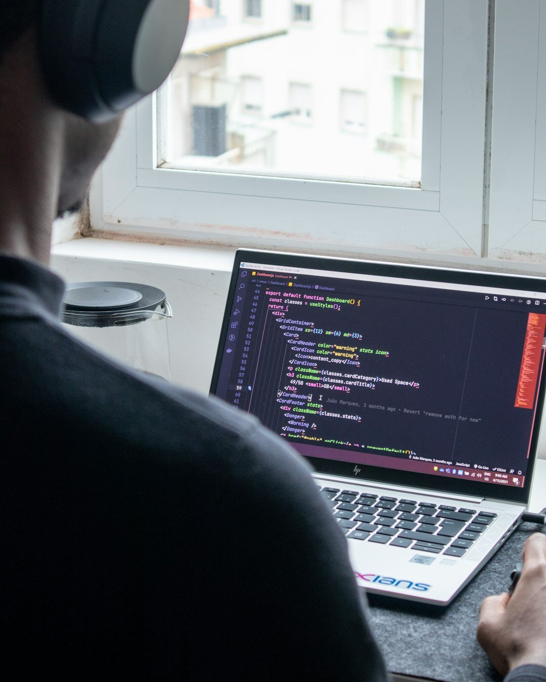 person reviewing code on screen