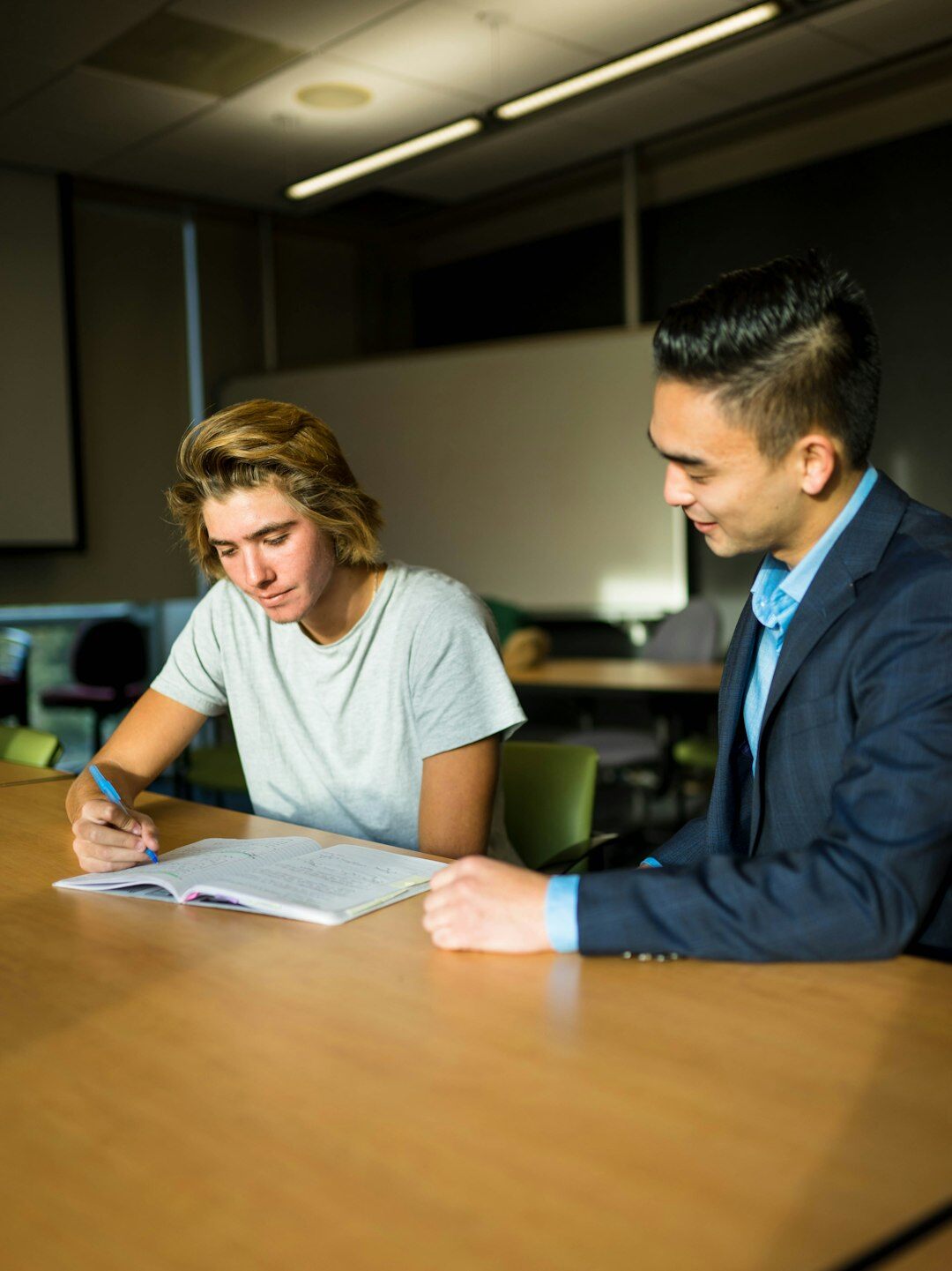 teacher guiding student discussion
